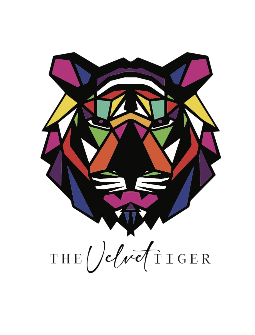 The Velvet Tiger Dispensary logo